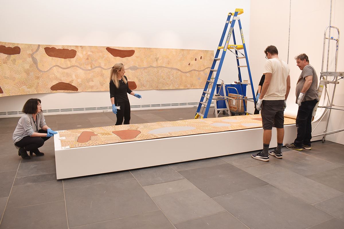 Installation of Standing on Country, Peggy Griffiths-Madij, Tarnanthi 2019, Art Gallery of South Australia, Adelaide with Artlab Paper Conservators and Art Gallery installation team. Image: Artlab Australia.