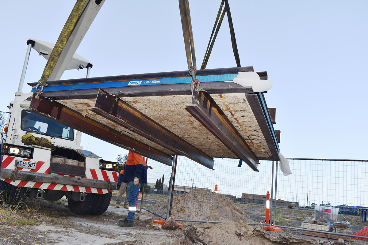 photo of Mosaic lift using a Franna crane truck. 