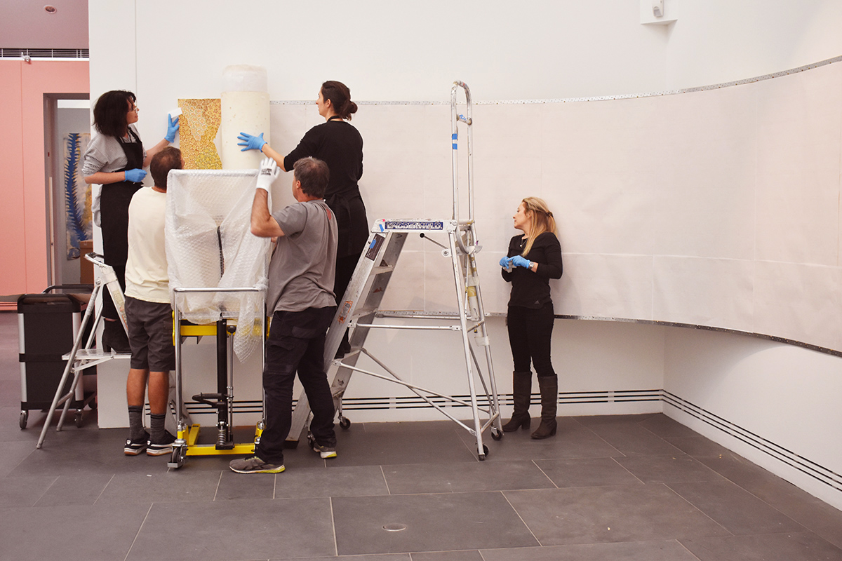 Installation of Being in Country – Woorrilbem to Thamberalm, Peggy Griffiths-Madij, Art Gallery of South Australia, Adelaide with Artlab Paper Conservators and Art Gallery installation team. Image: Artlab Australia