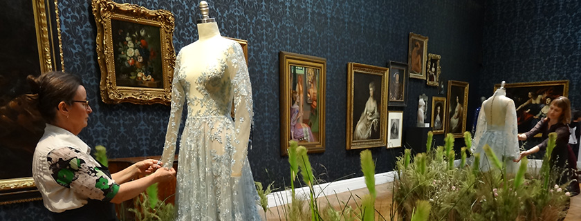 Textiles conservators working on exhibition at the Art Gallery of SA