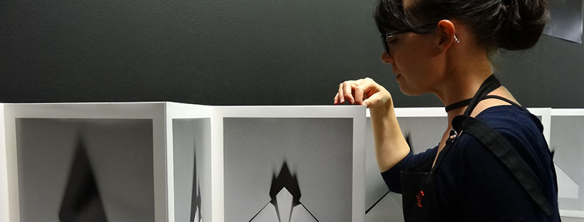 Paper conservator exhibition preparation