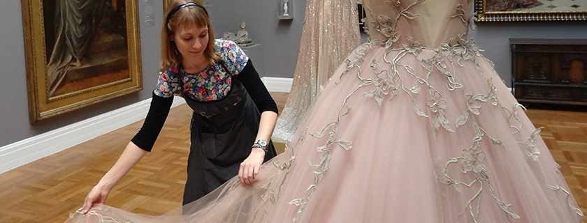 Textile conservator with dress