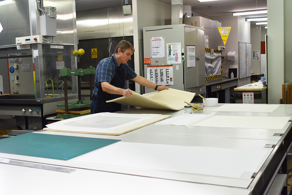 Paper conservator exhibition preparation