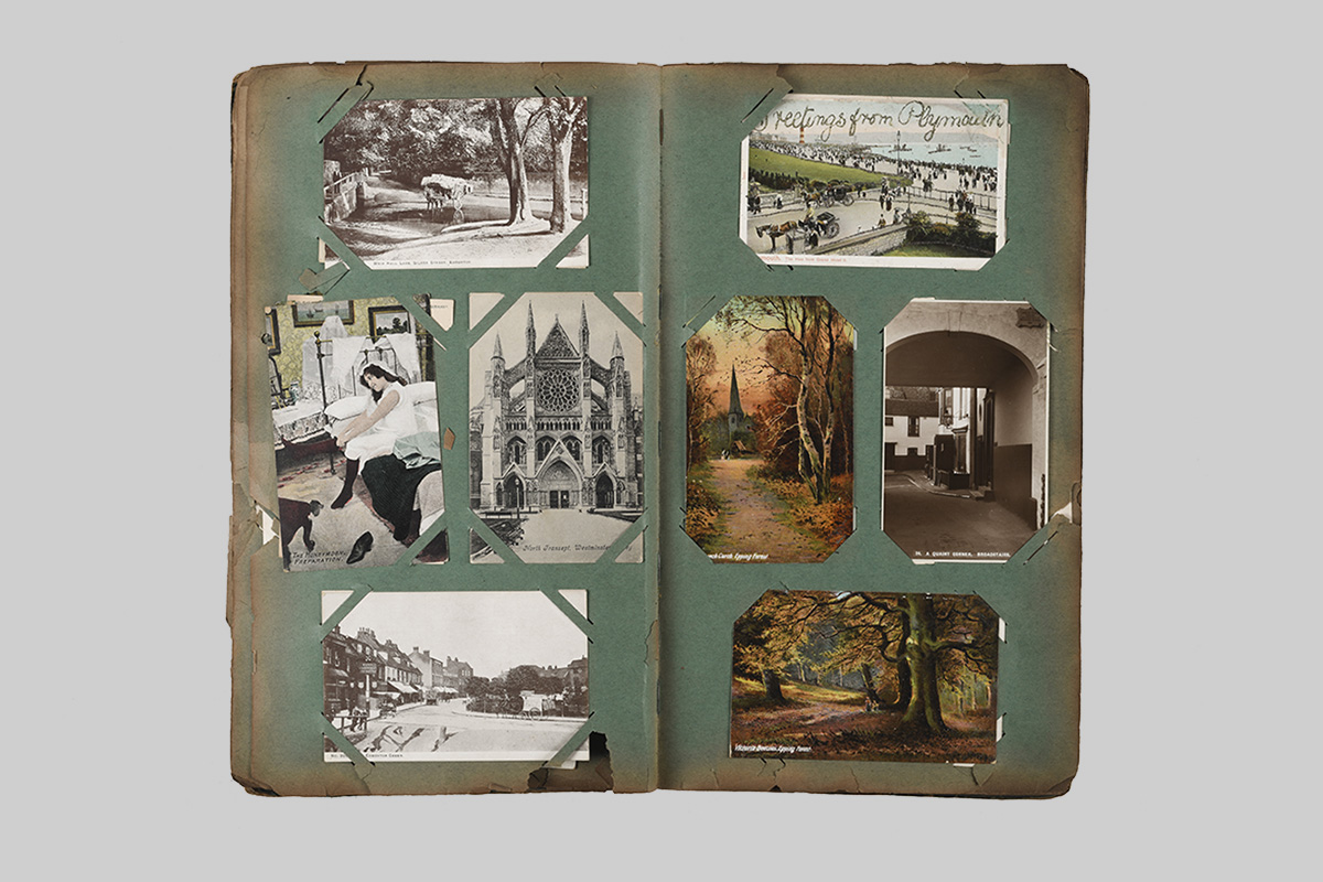Detail of postcards and damaged pages