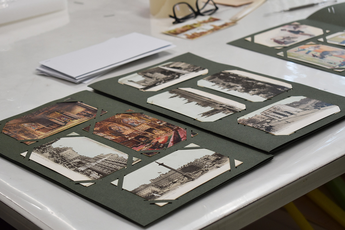 New pages with original postcards before binding